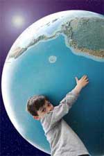 Child holding globe